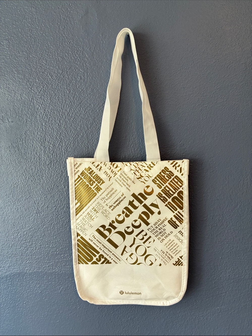 Lululemon athletica White Gold Tote with Gold Graphic Slogan Excellent Condition